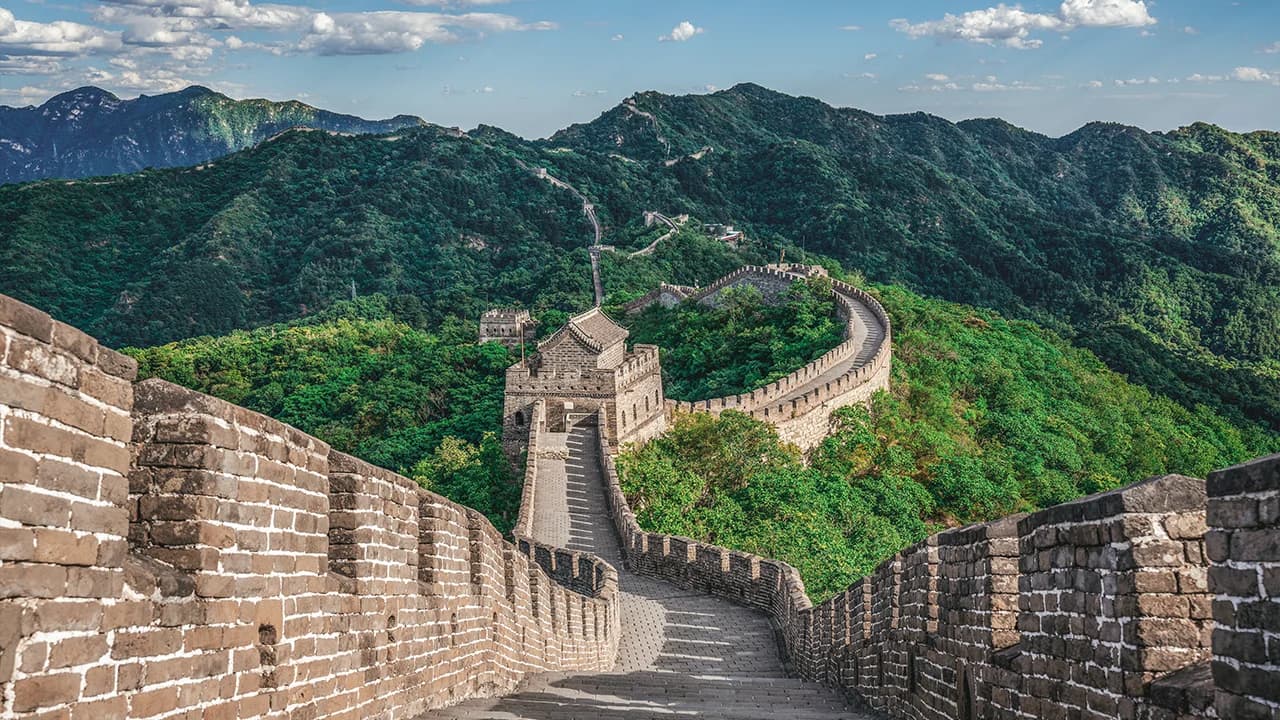 Mutianyu Great Wall winding through mountain forest