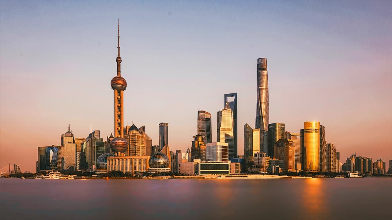 Shanghai skyline at sunset with Oriental Pearl Tower