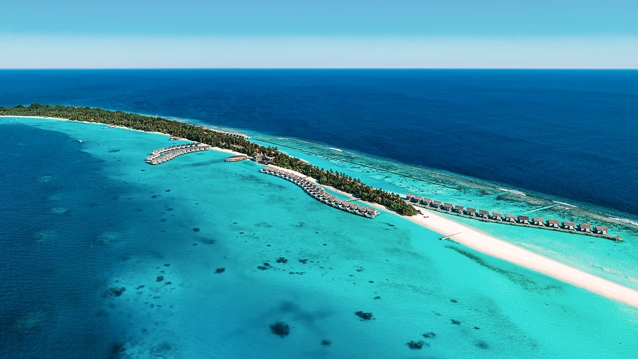 Aerial view of floating resort overwater bungalows in the Maldives