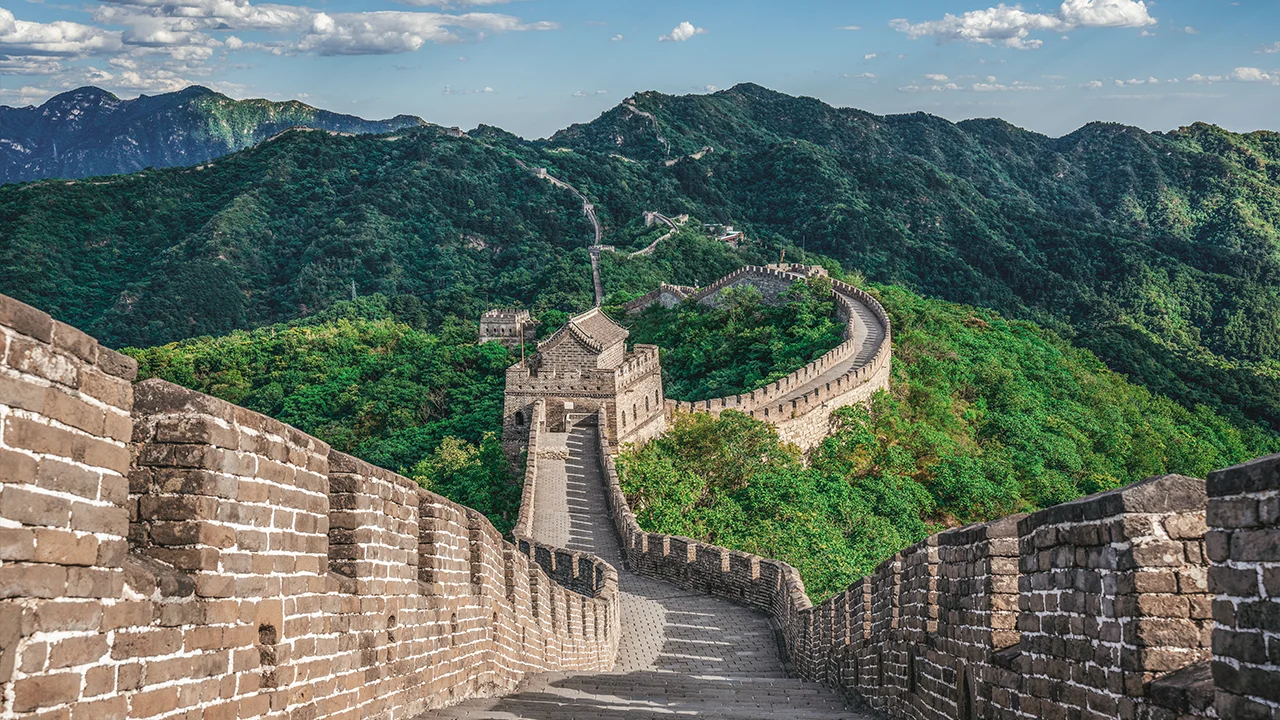 Mutianyu Great Wall winding through mountain forest